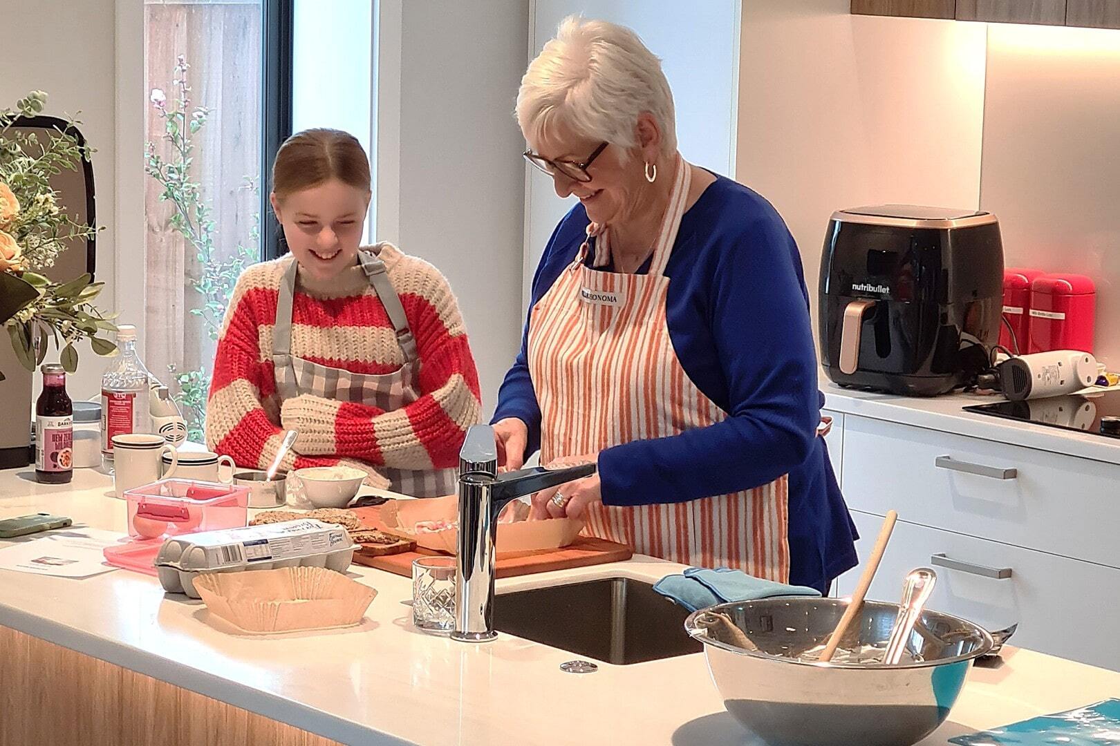 Ryman resident with great niece making easy air fryer recipes