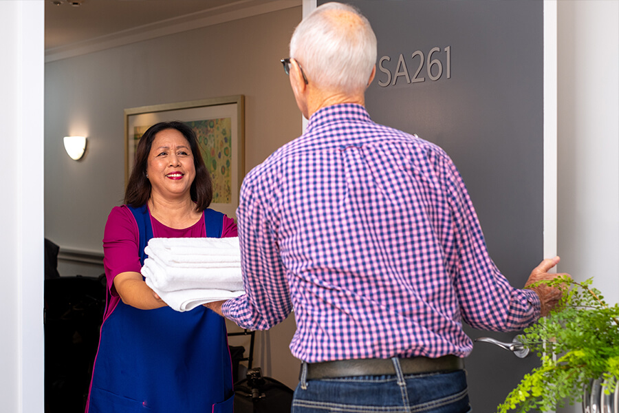 Housekeeper and assisted living resident