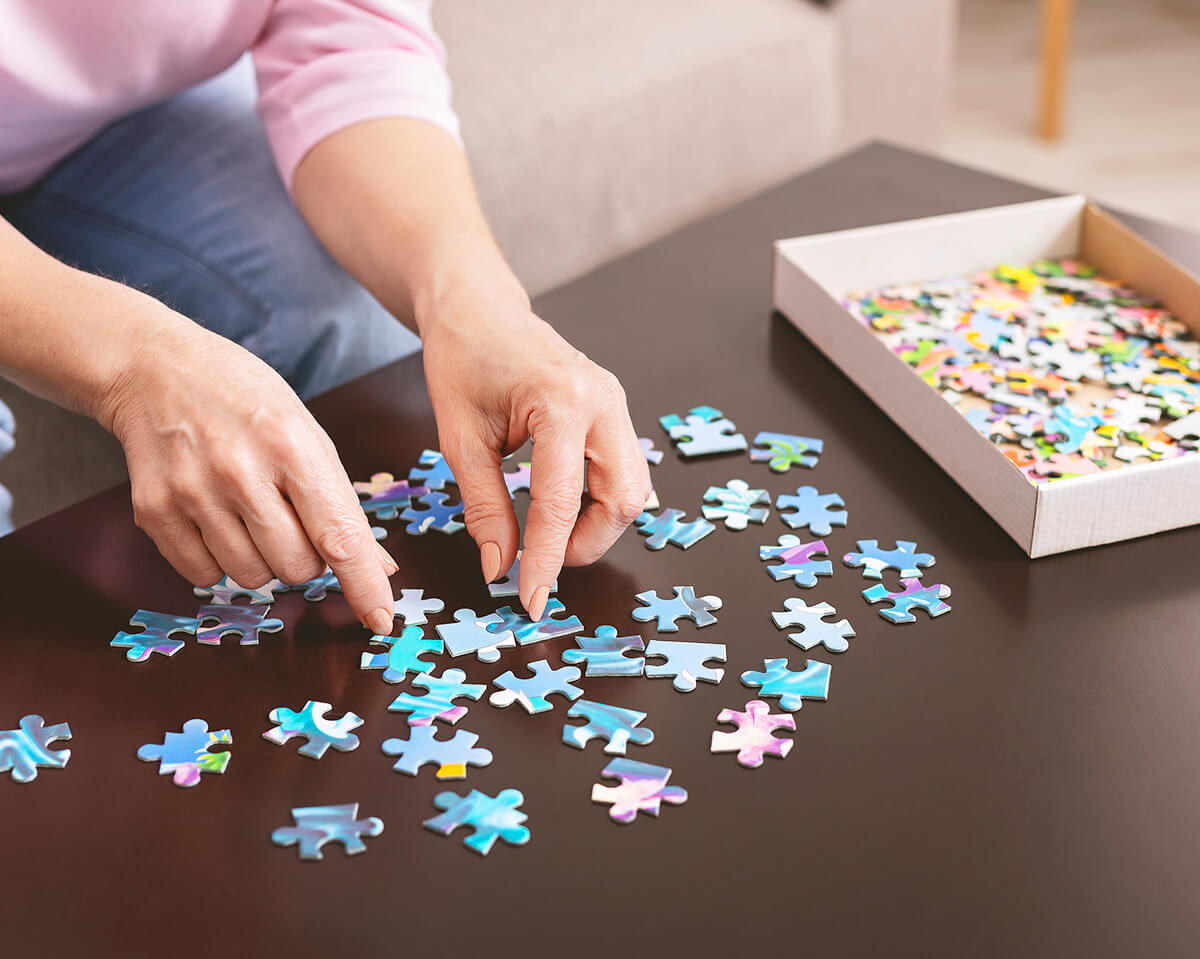 Puzzle and hands