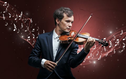 Lonely musical composer with violin and sparkling musical notes around