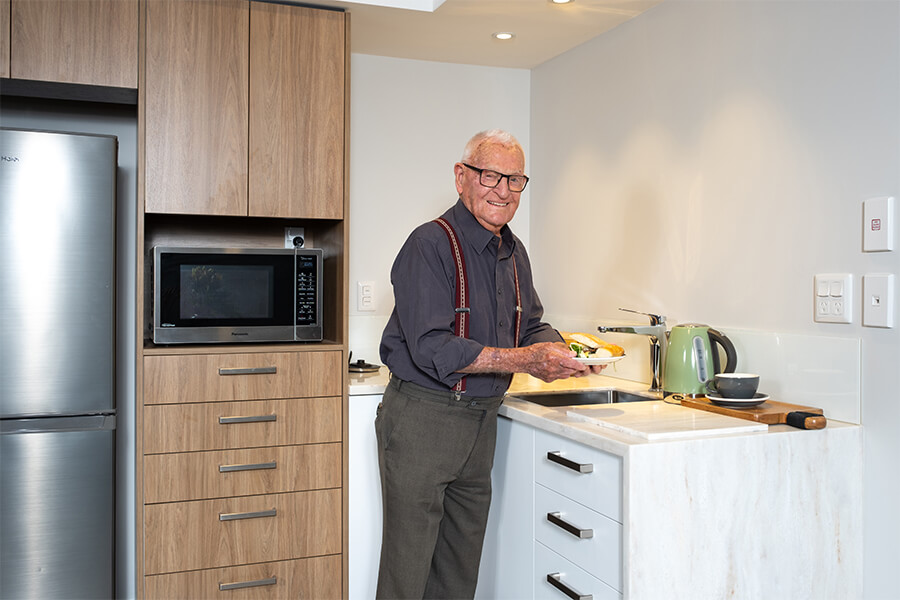 Victor in serviced apartment kitchen