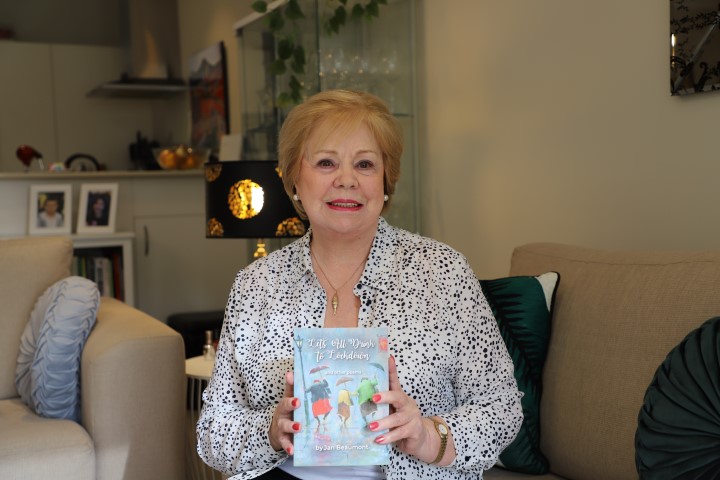 Jan Beaumont holding book